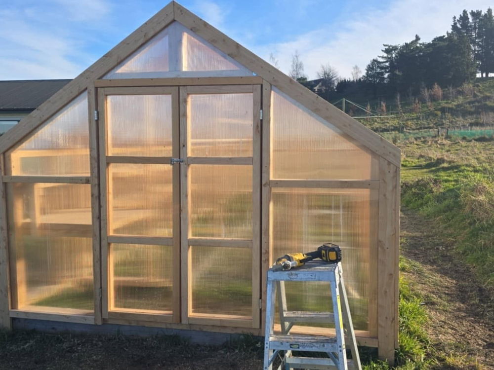 Front elevation of the finished greenhouse, hinged door in the middle